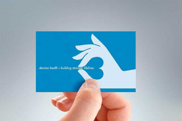 Verso of Decima Health business card, two colours, black and blue, two-sided design
