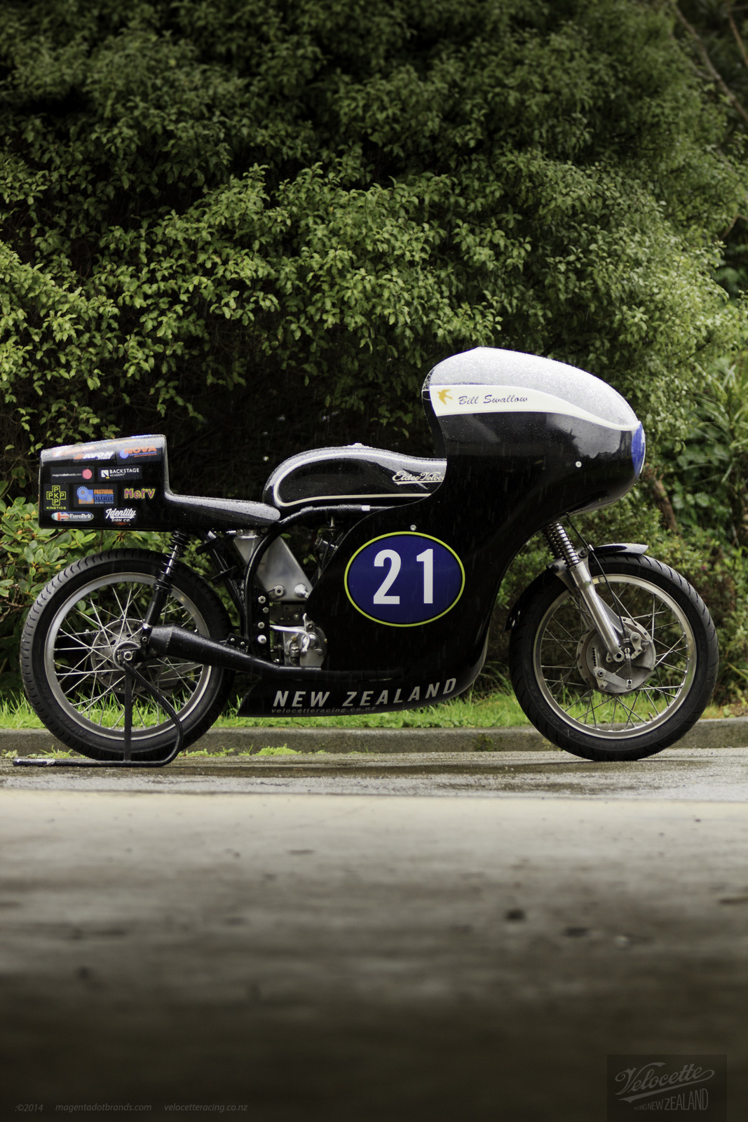 Eldee T.T., lightweight, Velocette special, side elevation, starboard side, aerodynamic tail, sponsor’s logos array, carbon-fibre racing, seat, petrol tank, fairing, publicity photo, Nick Thomson, photographer, Shaun Waugh, MagentaDot Brands