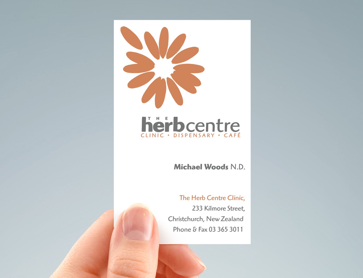 Herb Centre business card hand-held