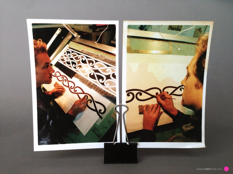 Painting the Maori kowhaiwhai design onto a sheet of translucent Mylar using a No.3 sable brush, ‘Plum tree’ photo opaque fluid and a drawing bridge. This painted design is printed around the waistband of the shirt, front and back to complete the Jewelled Gecko garment print.