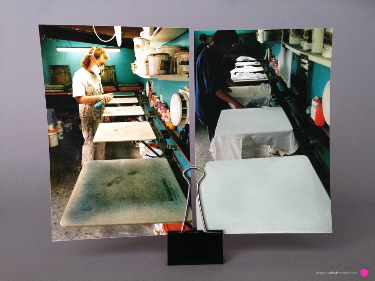 Left photo: Shaun applies spray adhesive to the the ten smooth vinyl topped aluminium screenprinting pallets wearing a respirator mask. Right photo: Deborah loads the pallets with blank white teeshirts in preparation for printing. Chrissie is loading the 8 screenprinting stencil frames with their respective inks.