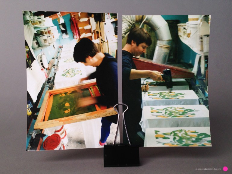 Chrissie prints the third colour, orange.