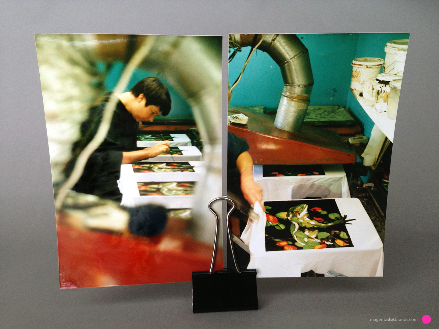 Chrissie proofs each black design while the ink is still wet and manually touches up the black to ensure it is solidly covering where it is supposed to cover.