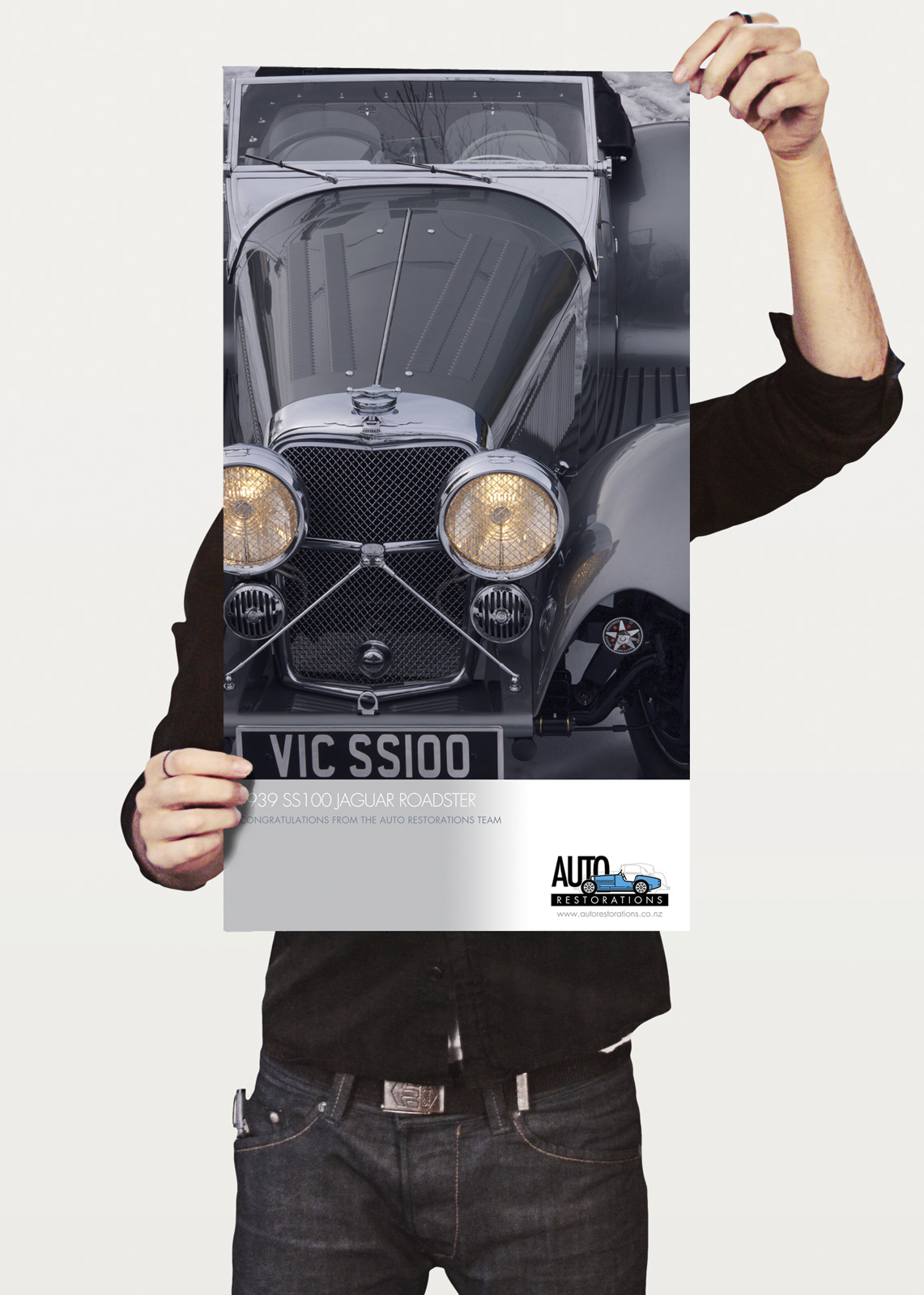 Commemorative 1939 SS100 Jaguar Roadster poster, signed by the craftsmen who restored it and gifted to the owner by Auto Restorations.