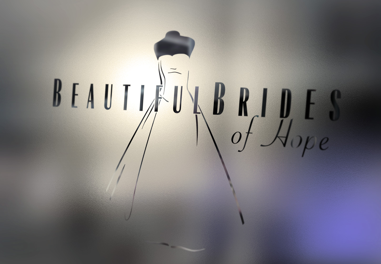 Closeup of Beautiful Brides of Hope bridal couture logo on frosted window glass. The finessed bridal illustration and type together create an elegant integrated singular brand expression. Graphic design, logo design, Christchurch, New Zealand.