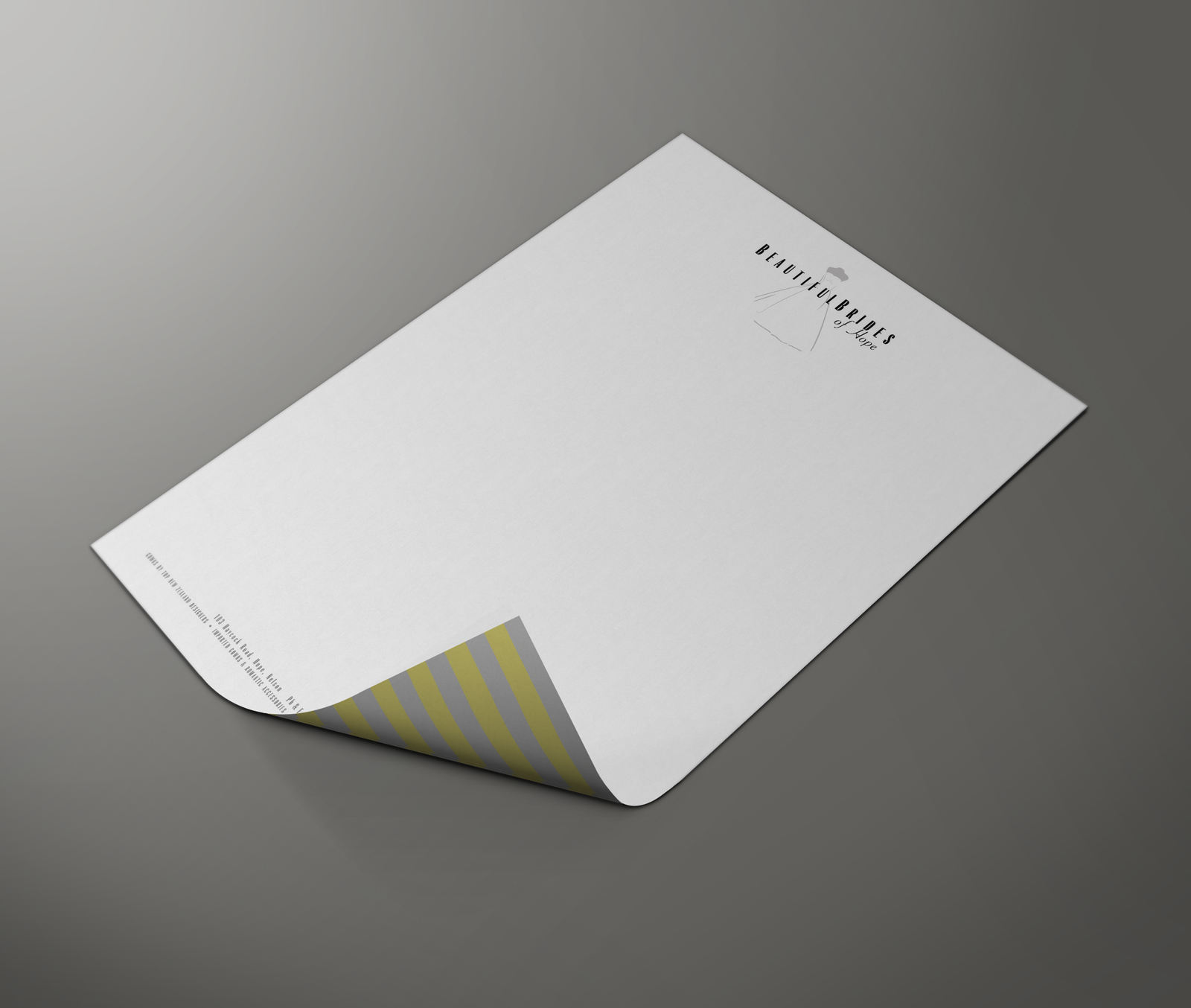 Beautiful Brides of Hope bridal couture printed letterhead, two-sided design, three colour, pastel yellow, pastel grey and black, logo symbol within and amongst type, subtle bridal striped patten on the back, Brand naming, Brand and identity systems design, Illustration, icon design, print production