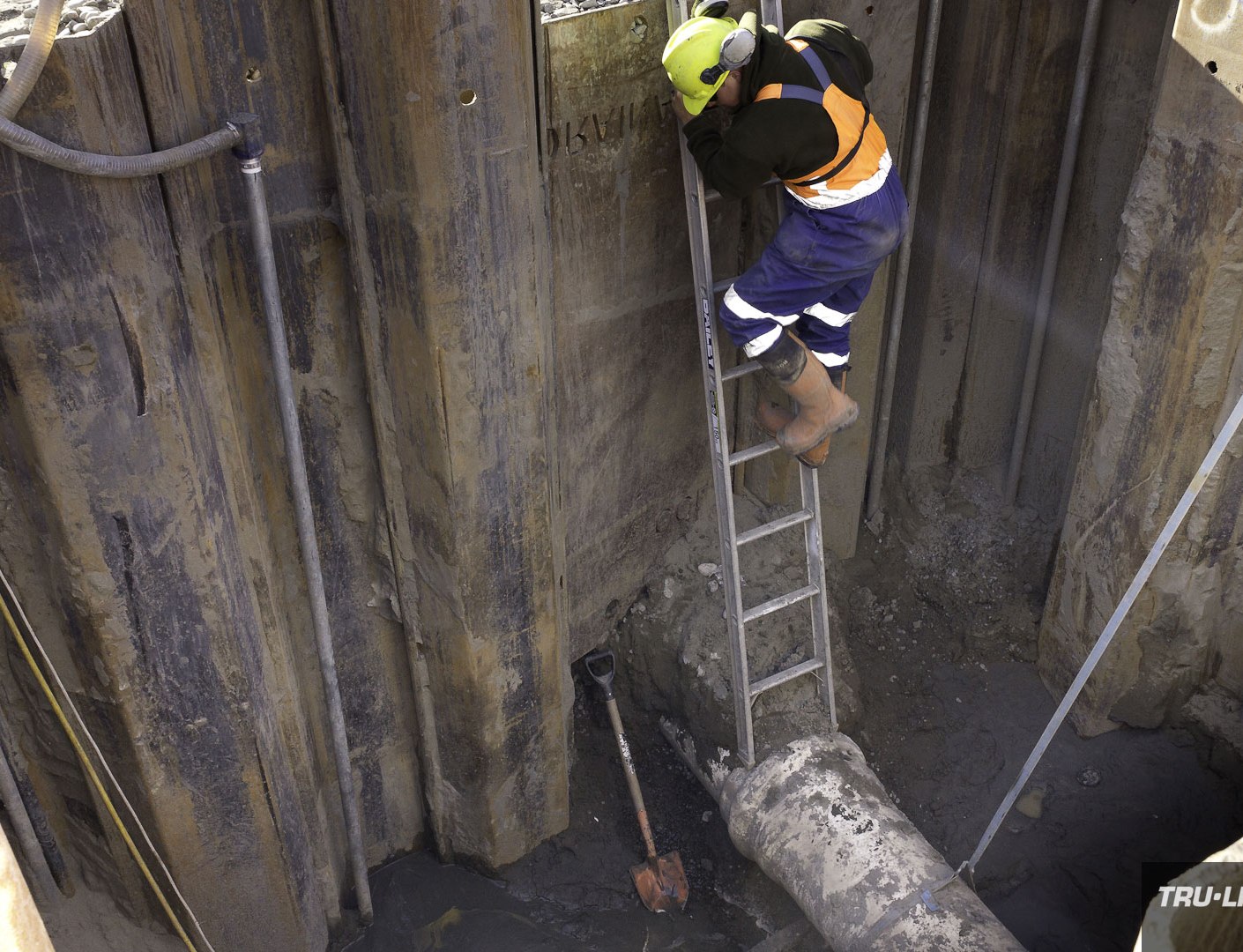 Entering the 5m entry pit, Horizontal Directional Drilling, Tru-Line Civil, documentary photography, Parklands West, Christchurch, New Zealand, Gravity Wastewater Replacement, HDD