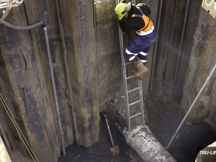 Entering the 5m entry pit, Horizontal Directional Drilling, Tru-Line Civil, documentary photography, Parklands West, Christchurch, New Zealand, Gravity Wastewater Replacement, HDD