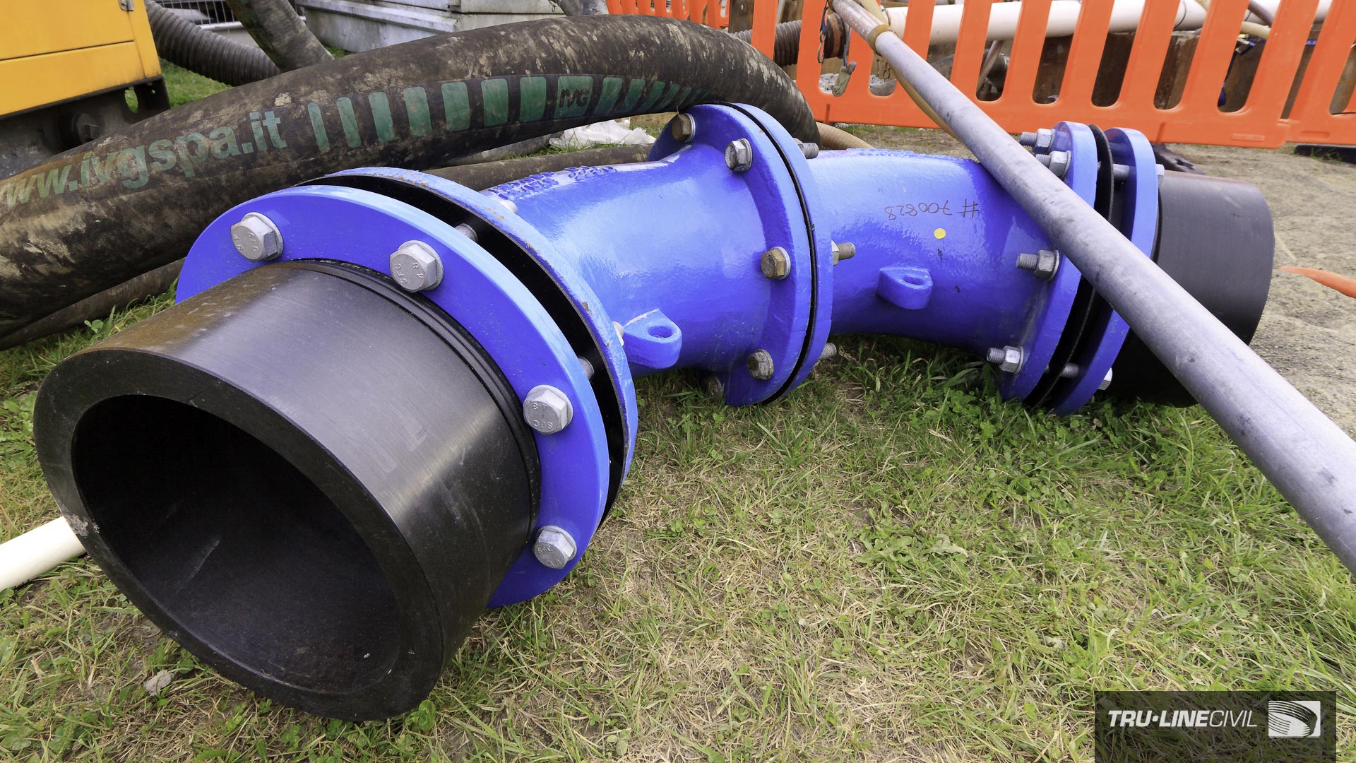 Steel 90° “elbow” bend to be welded into in the main sewage line at over 4m depth in very challenging, saturated sandy ground. Horizontal Directional Drilling, Tru-Line Civil, documentary photography, Parklands West, Christchurch, New Zealand, Gravity Wastewater Replacement, HDD.