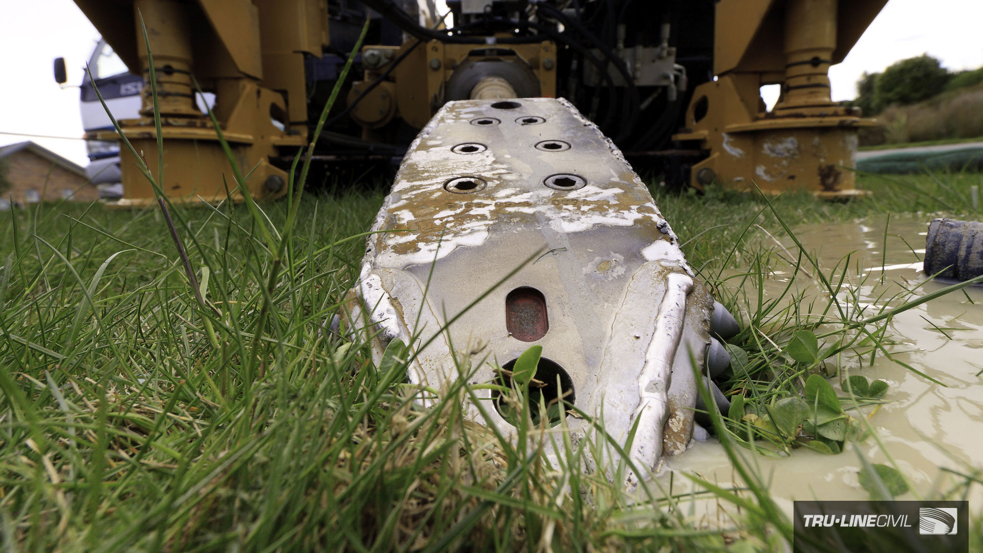 The 125mm pilot drill bit and HDD unit. Horizontal Directional Drilling, Tru-Line Civil, documentary photography, Parklands West, Christchurch, New Zealand, Gravity Wastewater Replacement, HDD.