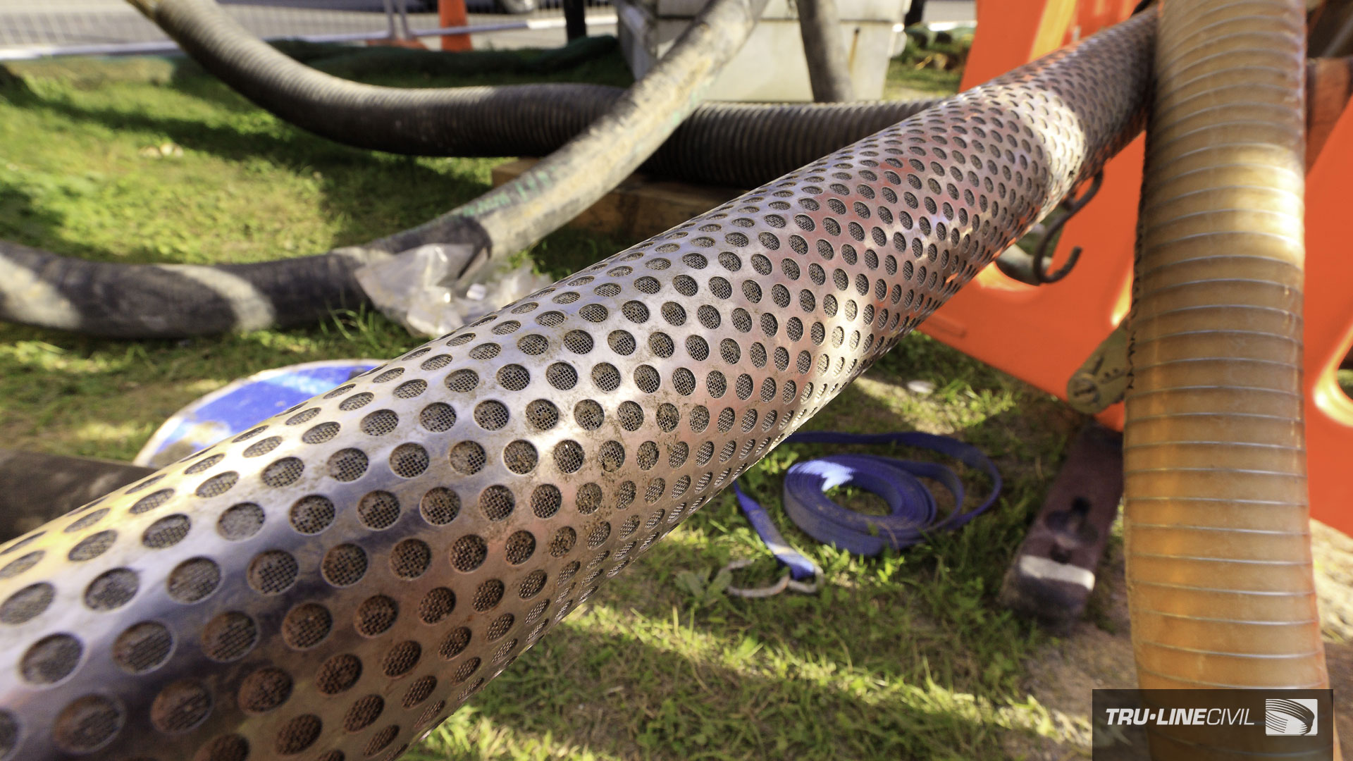 The business end of a “well-point dewatering system”, the 5m long dewatering lance. Horizontal Directional Drilling, Tru-Line Civil, documentary photography, Parklands West, Christchurch, New Zealand, Gravity Wastewater Replacement, HDD.