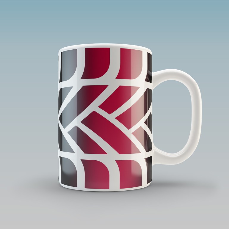 A white glazed ceramic mug with the MTC logo tyre tread pattern graphic wrapped around it.