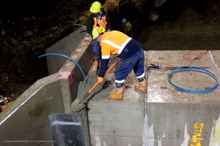 The penultimate task. Filling the western wing wall joint boxing with concrete the old fashioned way. 