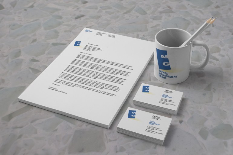 Events Management Group stationery and promotional items.