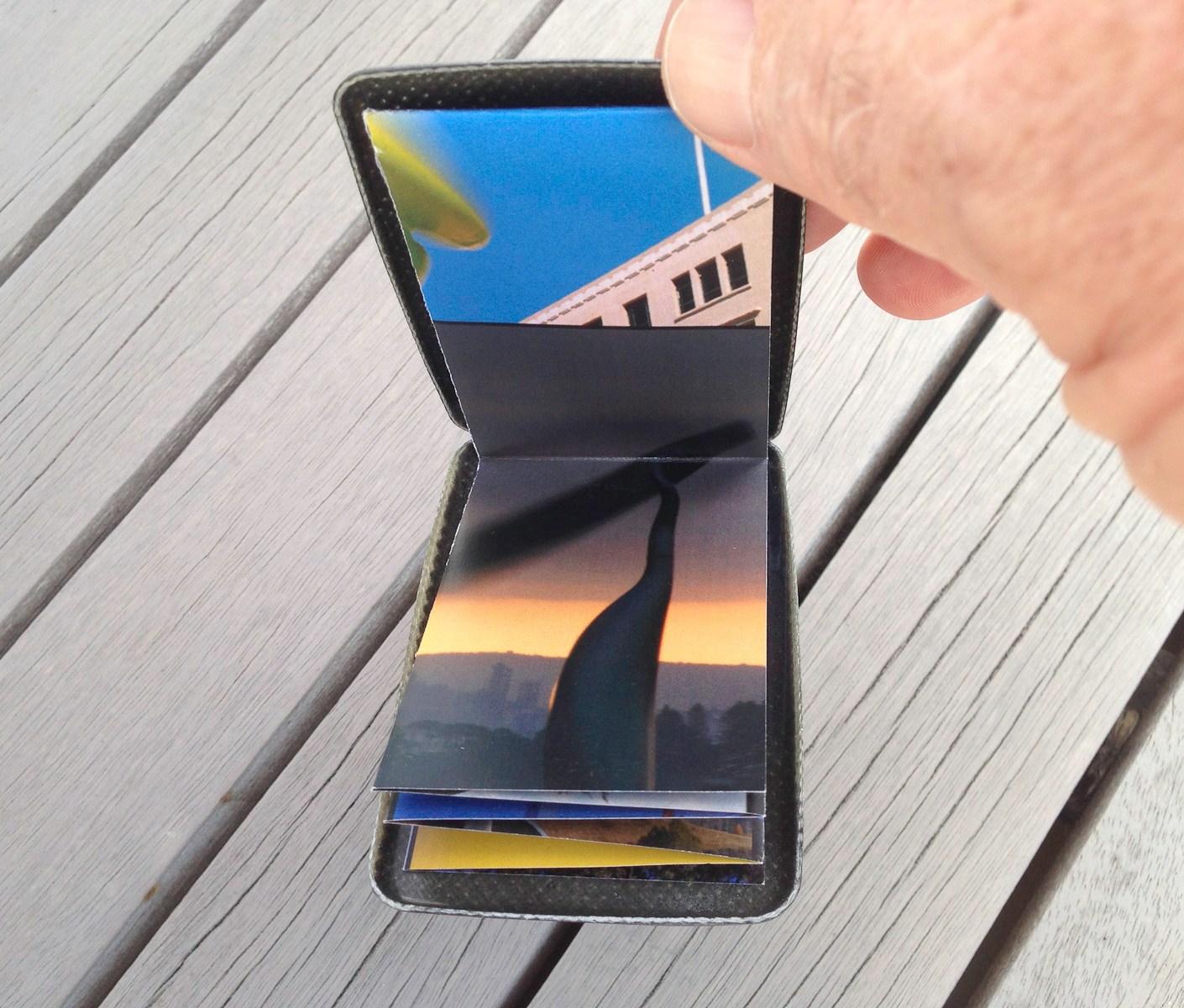 A pocket-size showcase brochure in a custom carbon fibre clam for the kinetic sculptures of Phil Price