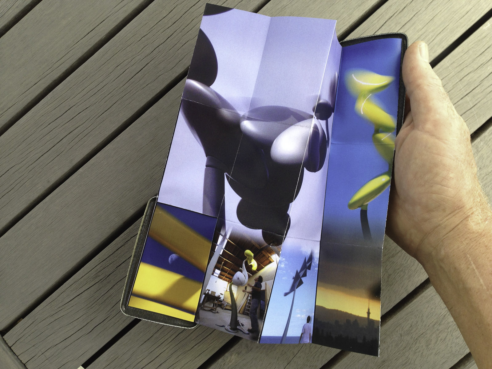 A pocket-size showcase brochure in a custom carbon fibre clam for the kinetic sculptures of Phil Price