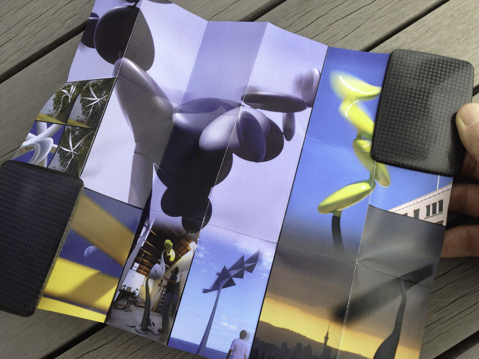 A pocket-size showcase brochure in a custom carbon fibre clam for the kinetic sculptures of Phil Price