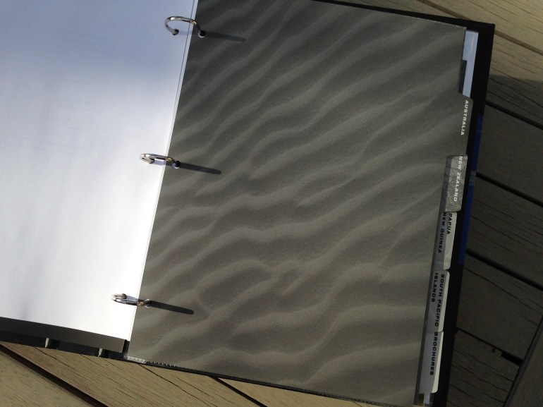 Affluent Travel Agency Toolkit. Australia tabbed section divider. Winnowed desert sands texture.