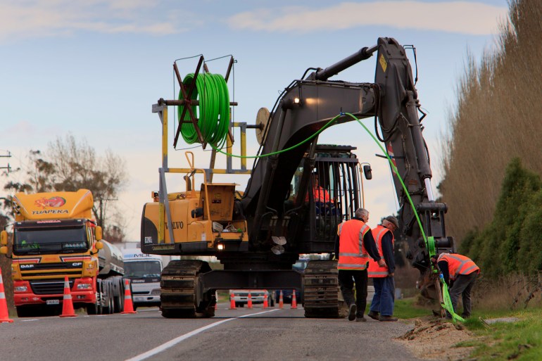 Volvo excavator, Ripper mole ploughing, State Highway 1