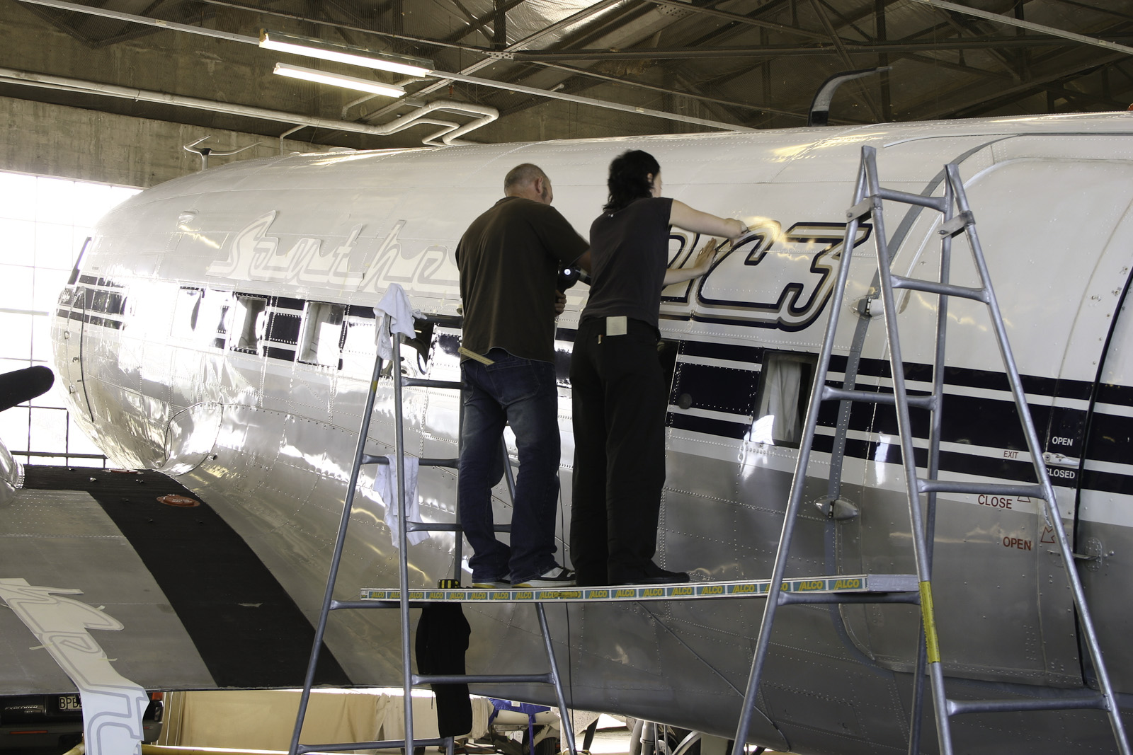 Southern DC3 ZK-AMY livery application, in the Hangar at Wigram