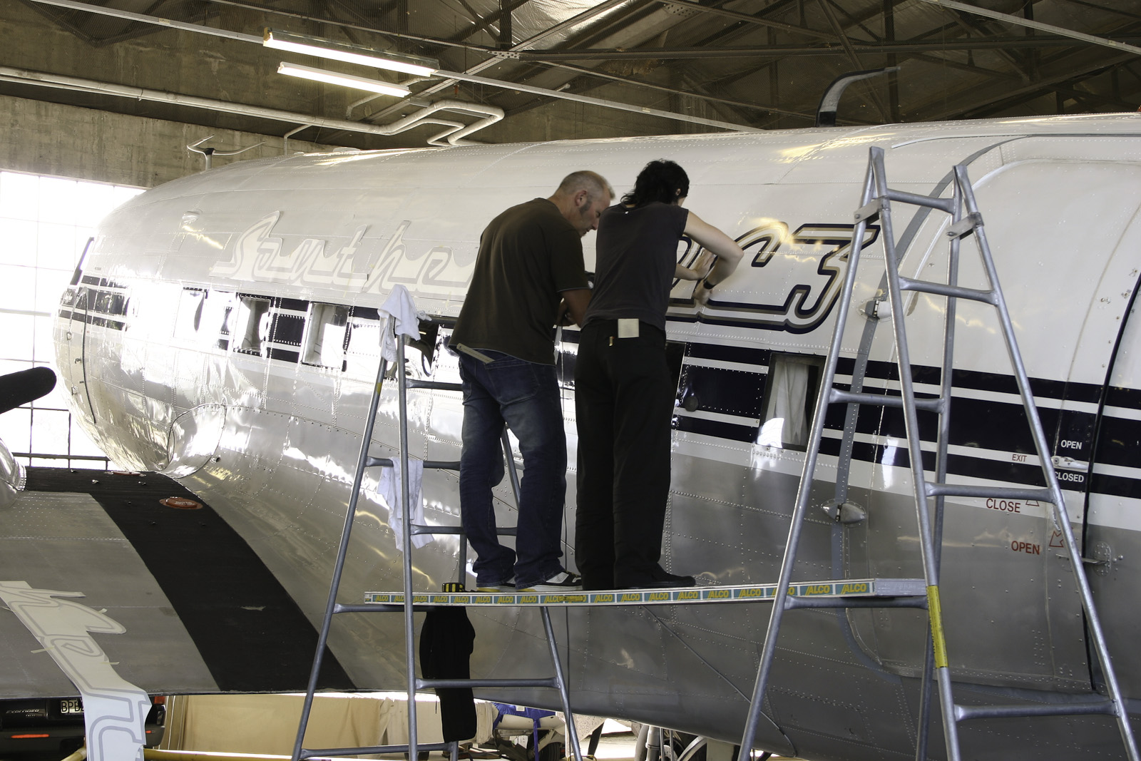 Southern DC3 ZK-AMY livery application, in the Hangar at Wigram