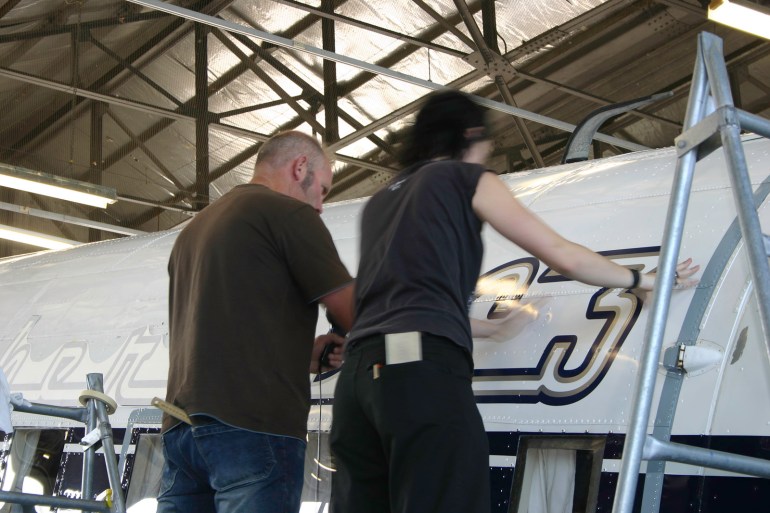Southern DC3 ZK-AMY livery application, in the Hangar at Wigram