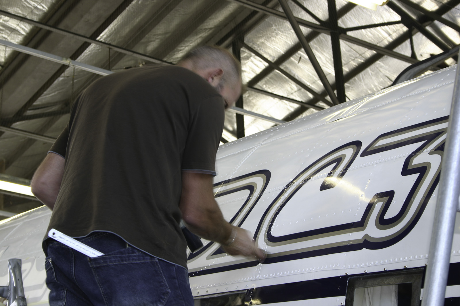 Southern DC3 ZK-AMY livery application, in the Hangar at Wigram