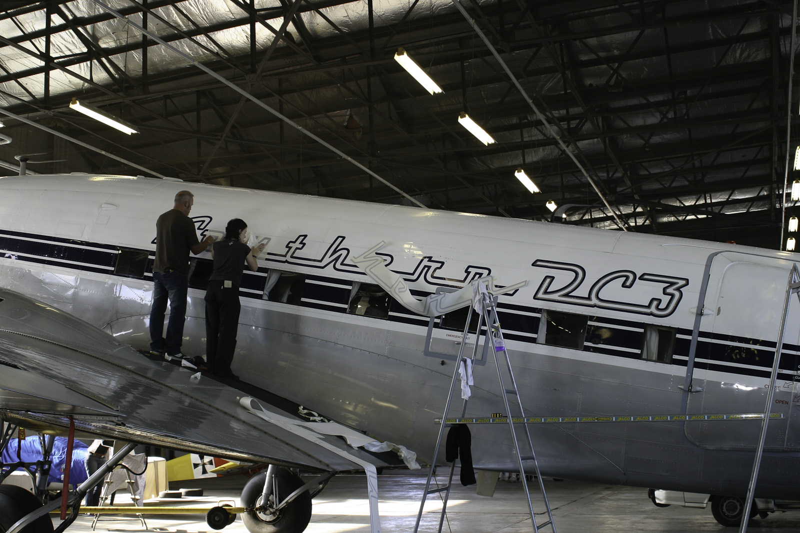 Southern DC3 ZK-AMY livery application, in the Hangar at Wigram, Chistchurch, New Zealand.