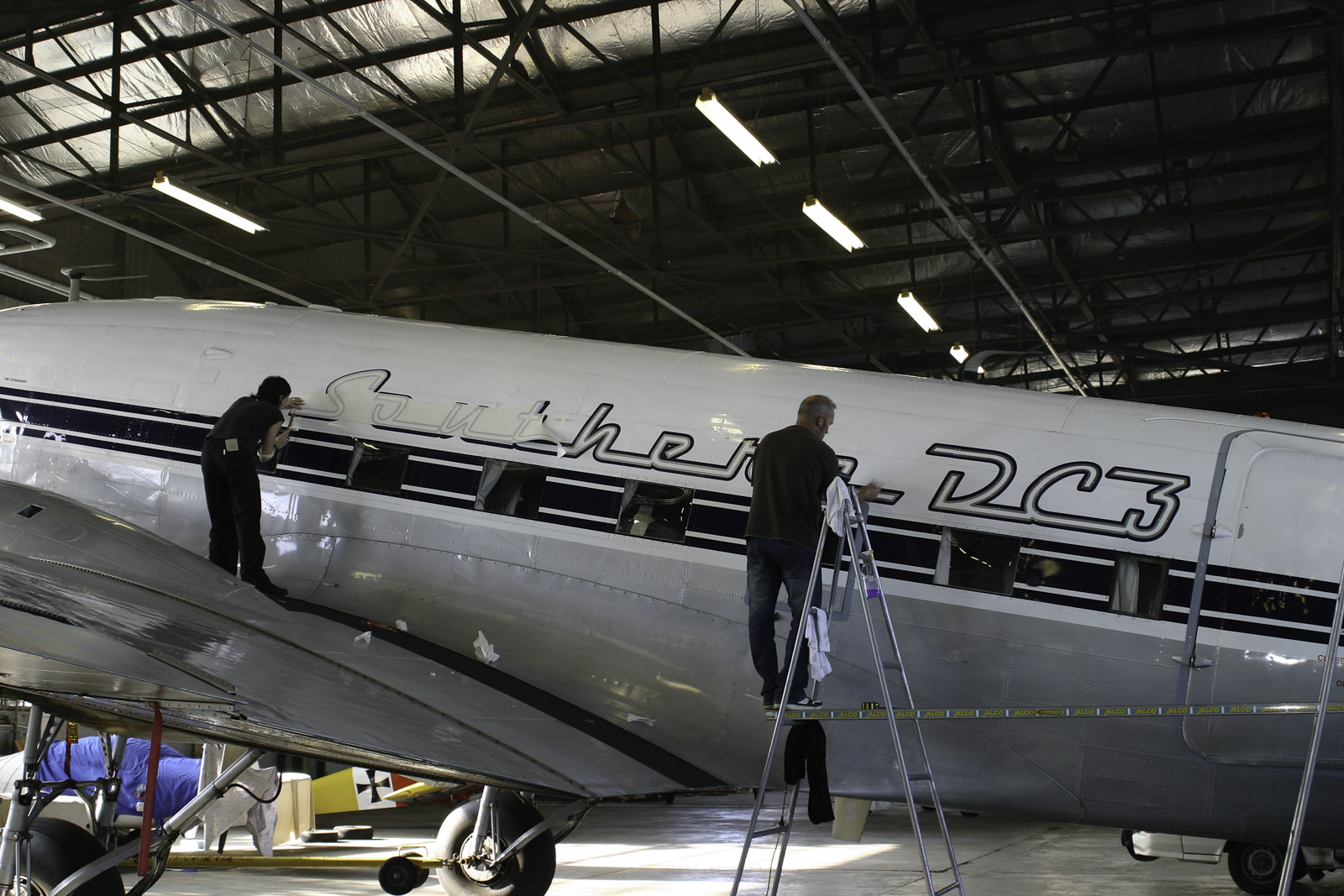 Southern DC3 ZK-AMY livery application, in the Hangar at Wigram