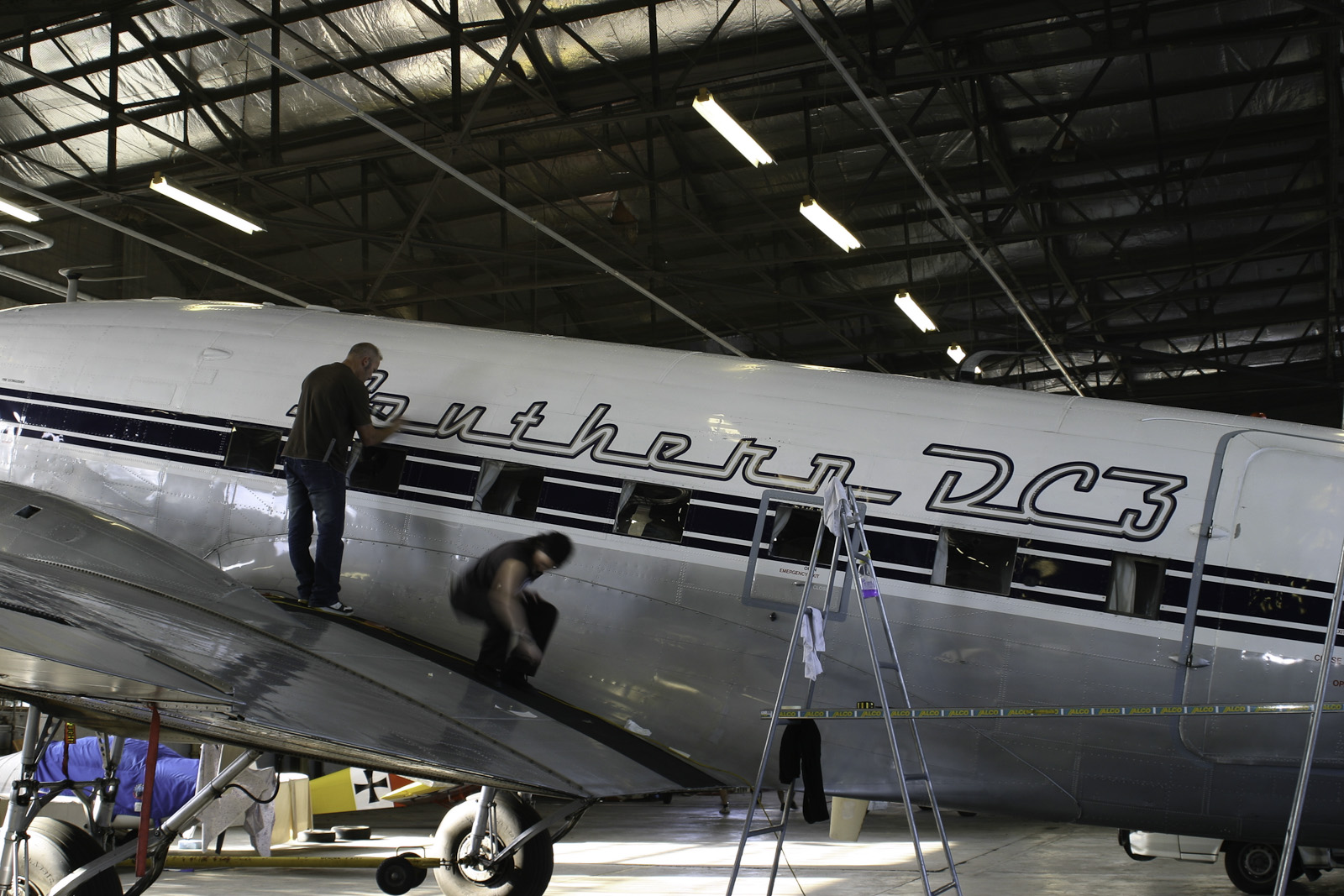 Southern DC3 ZK-AMY livery application, in the Hangar at Wigram, Chistchurch, New Zealand.