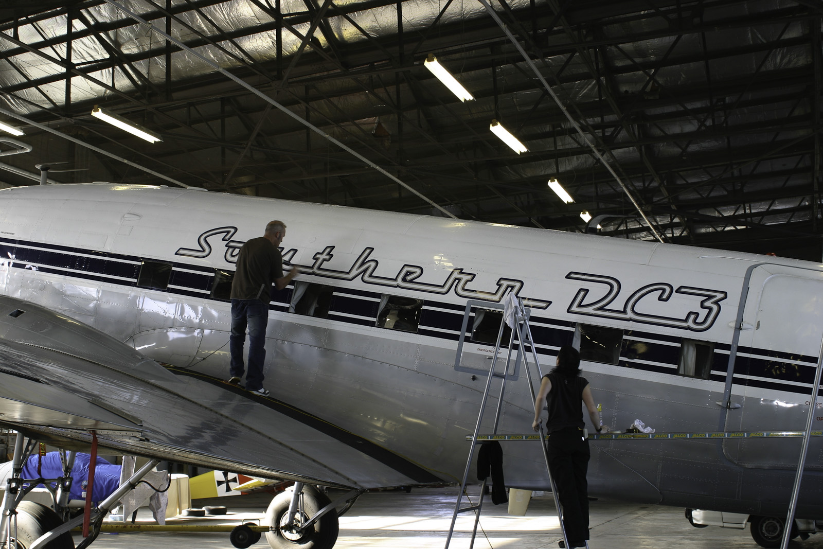Southern DC3 ZK-AMY livery application, in the Hangar at Wigram