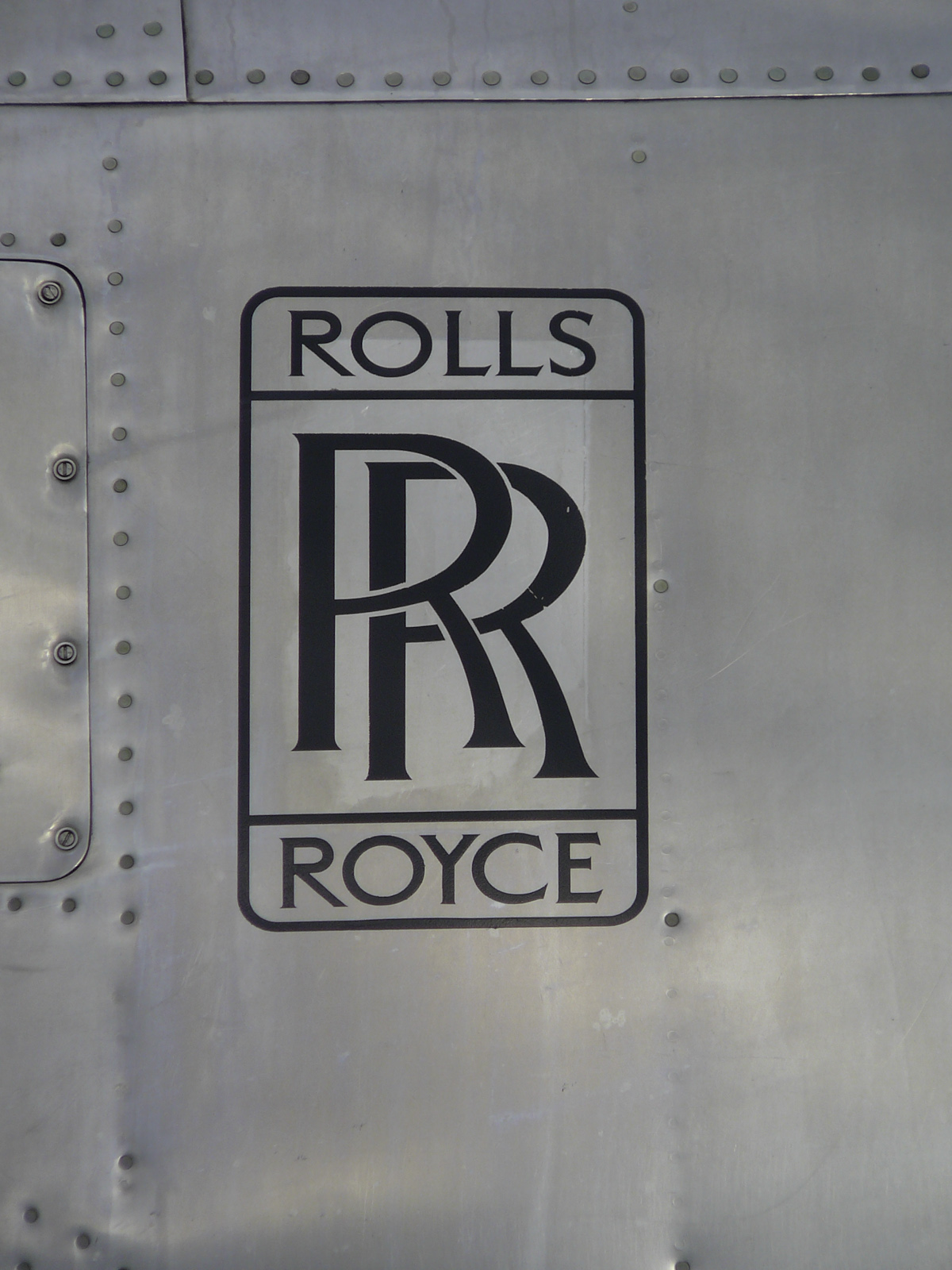 Rolls Royce logo on the polished alloy nacelle of Pionair Australia Convair VH-PDV.