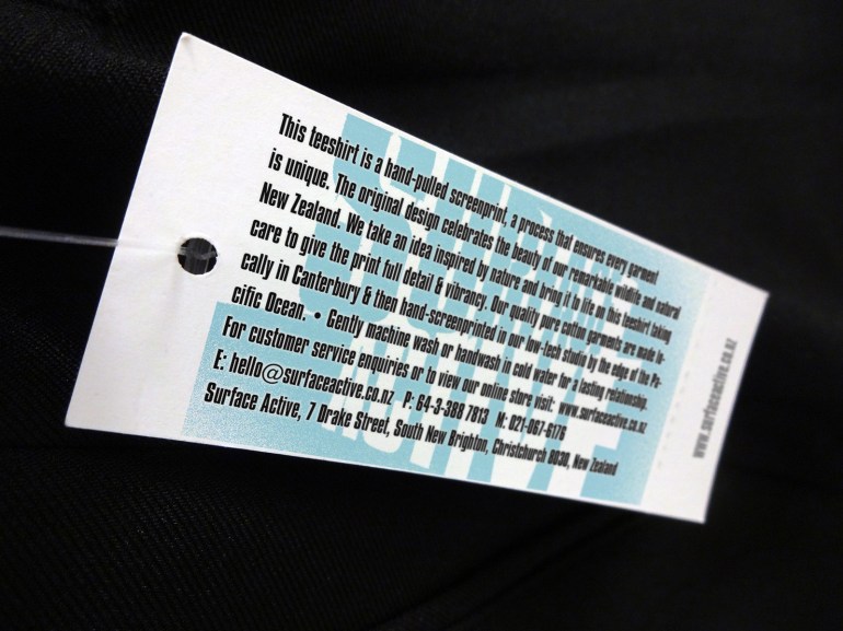 Surface Active T-shirt swingtag back.