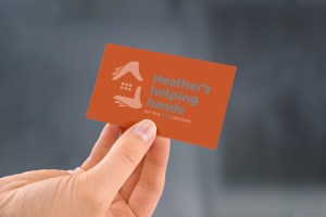 Draft concept for verso of Heather’s helping hands’ two colour business card design.