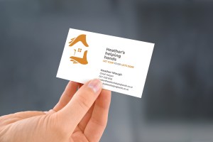 Heather’s helping hands business card, two colour, two-sided design.