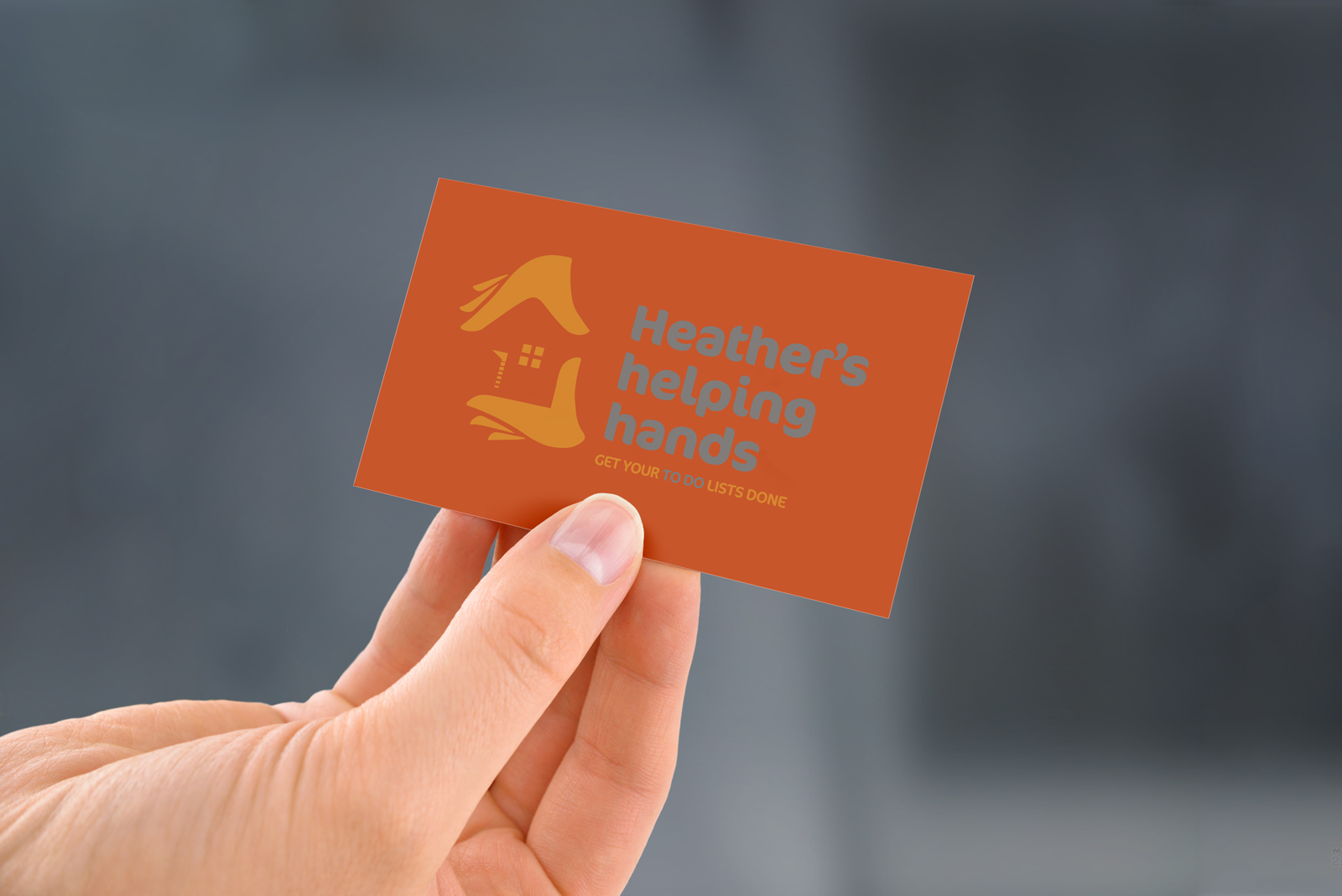 Back of Heather’s helping hands’ business card rejected draft two colour design.