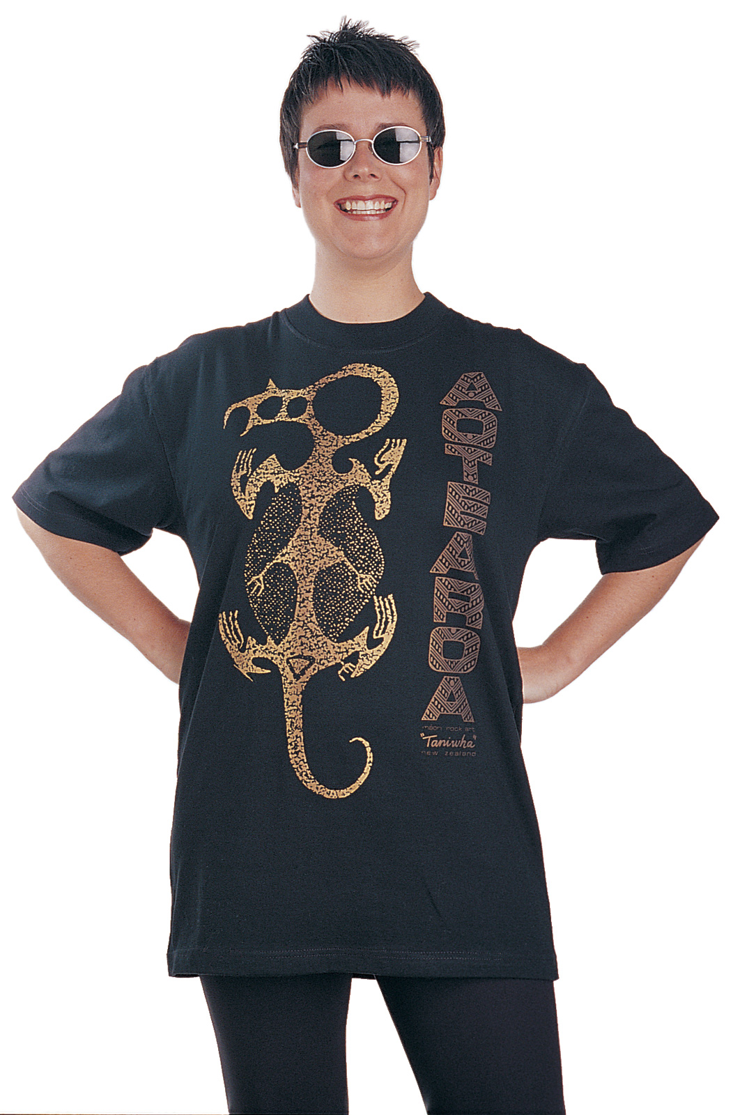 ‘Taniwha Aotearoa - Maori rock art New Zealand. One colour T-shirt print on black fabric.