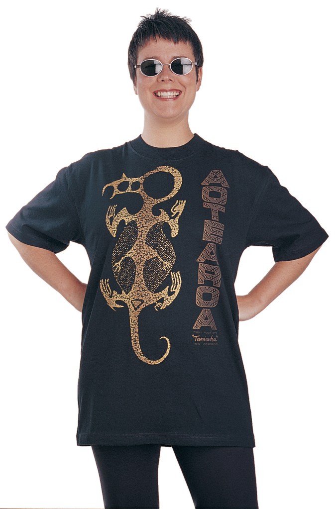 ‘Taniwha Aotearoa - Maori rock art New Zealand. One colour T-shirt print on black fabric.