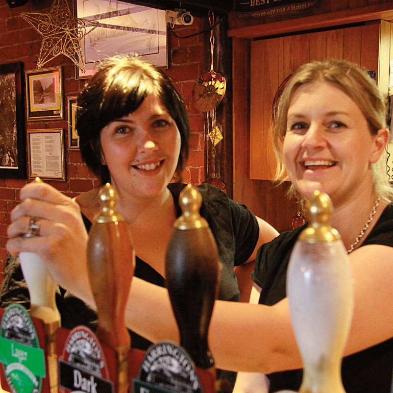 Two barkeepers, Pomeroys Old Brewery Inn.