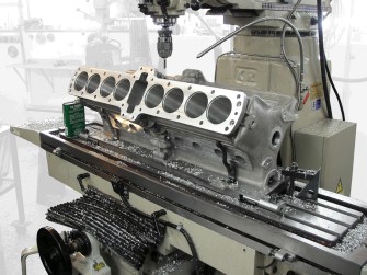 Machining the Delage GP engine silhouette masking out the busy distracting background to tone it down provides context and looks natural.