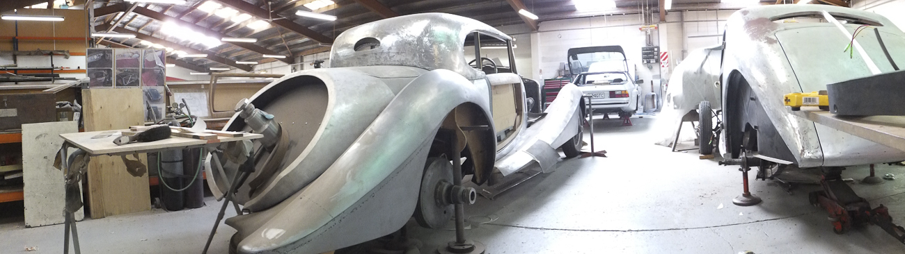 Auto Restorations Custom Coachbuilding Shop panorama. Left to right, Hispano Suiza and Bugatti.