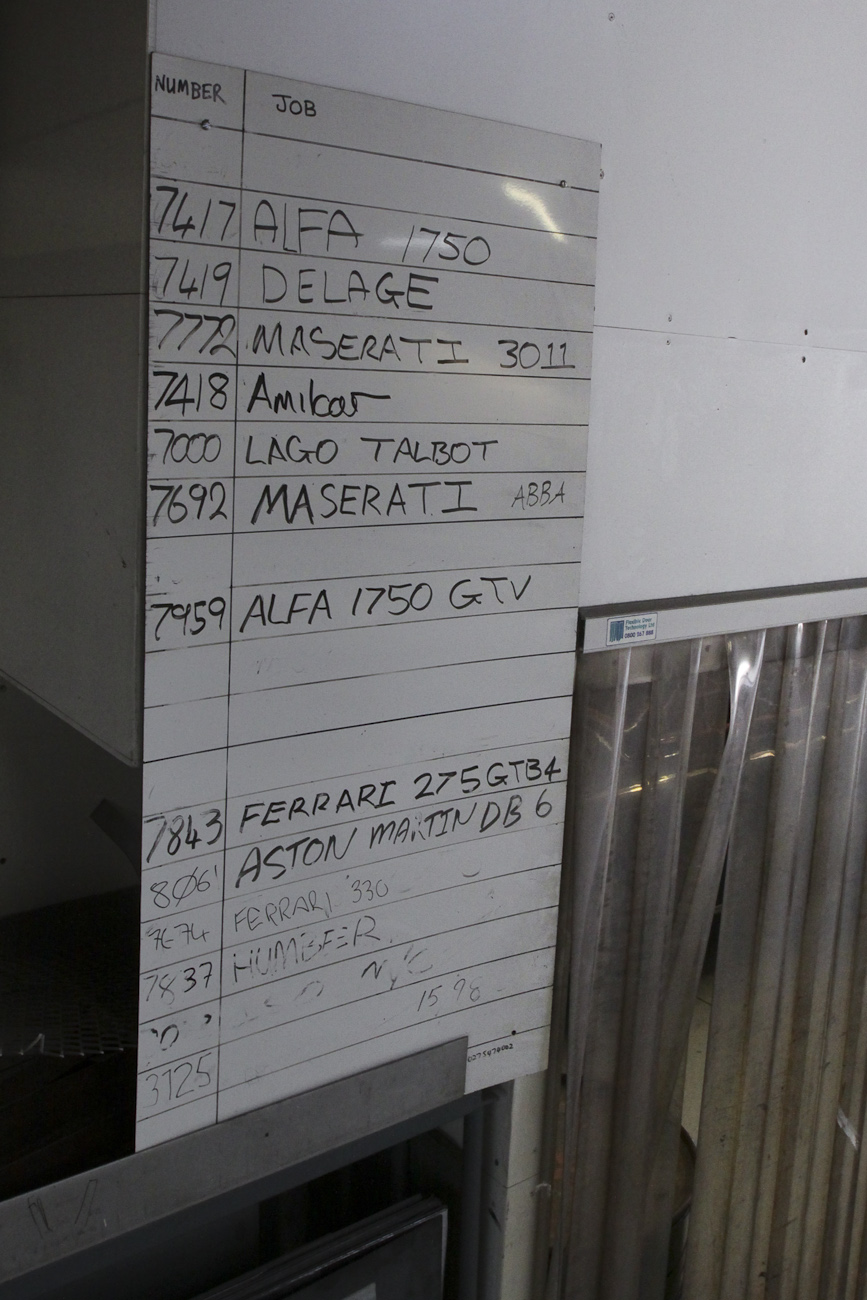 Panel Shop scene, Auto Restorations. Current jobs list. Alfa 1750, Delage, Maserati 3011, Amilcar, Talbot Lago, Maserati, Alfa 1750 GTV, Ferrari, Aston Martin DB6