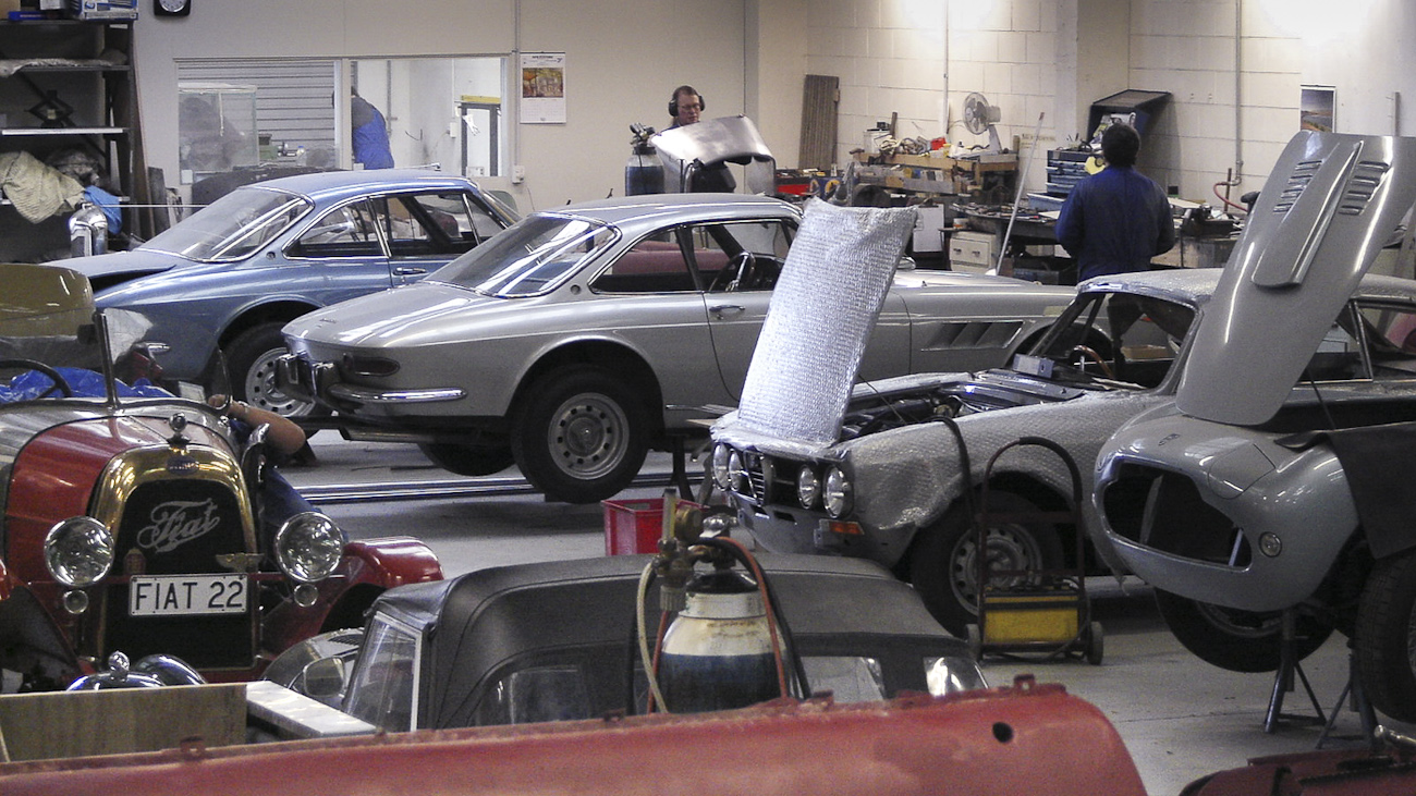 Line up of in-progress restorations of rare mid-century classics in the Panel Shop and at Auto Restorations. From front to back a Siata 280CS Balbo, an Alfa Romeo and a pair of Ferrari.