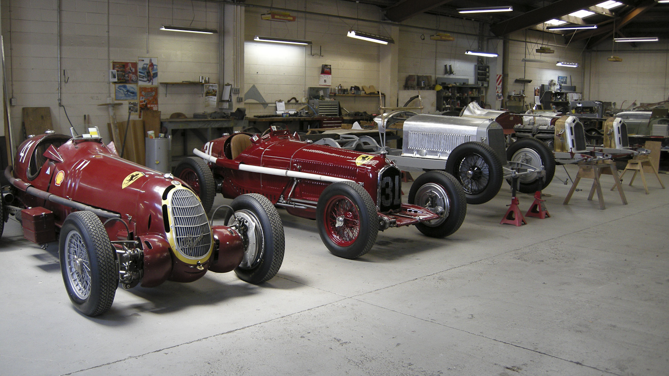 Line up of the in-progress “race preparation” of a team of Alfa Romeo classic racing cars in the Panel Shop and at Auto Restorations.
