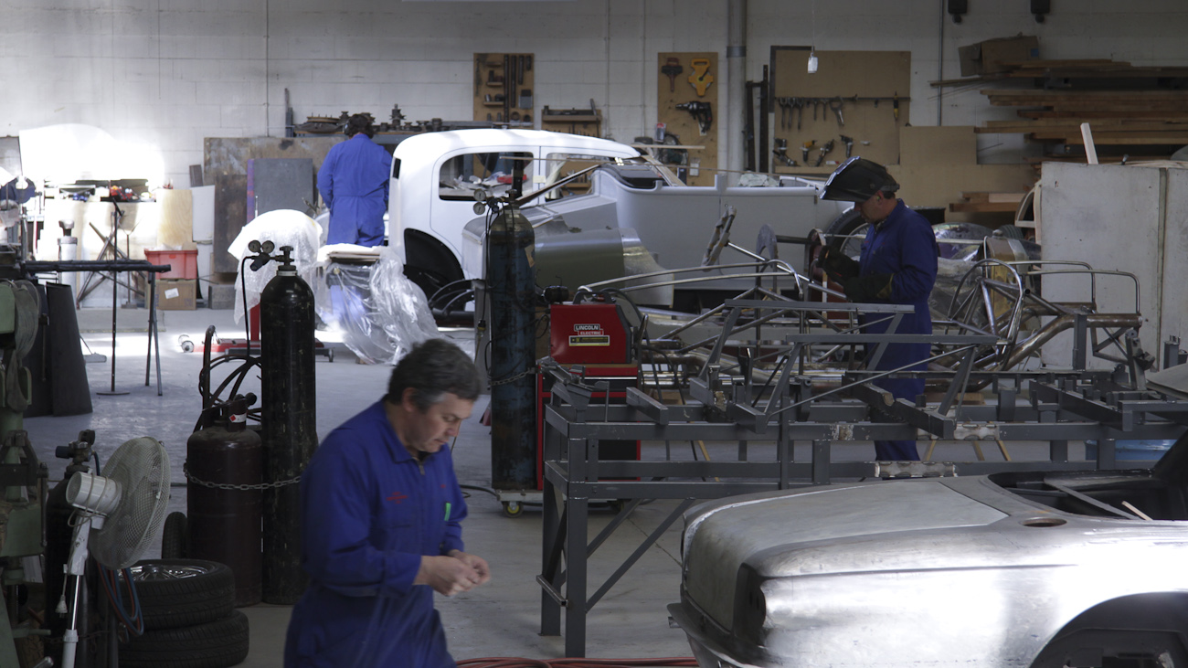 Bob Sterling and Andy Wiley go about their tasks in this wide view of the Panel Shop and Custom Coach Shop at Auto Restorations