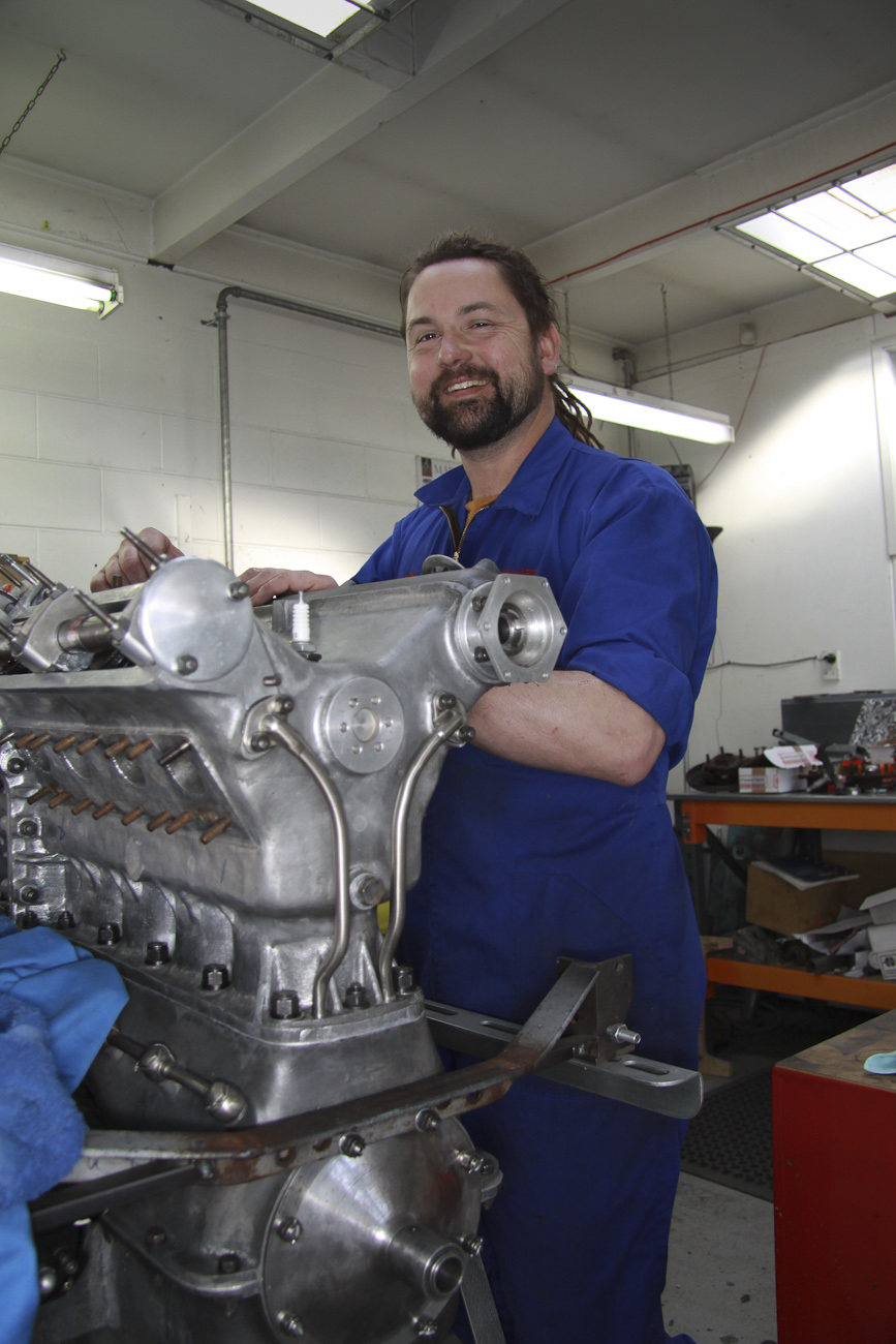 Richard Hope at work on rebuilding a classic V8 engine in the Mechanical Shop at Auto Restorations.