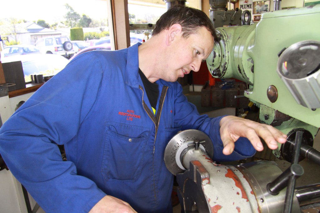 Simon Steffens machining a bespoke part in the Auto Engineering Shop at Auto Restorations.