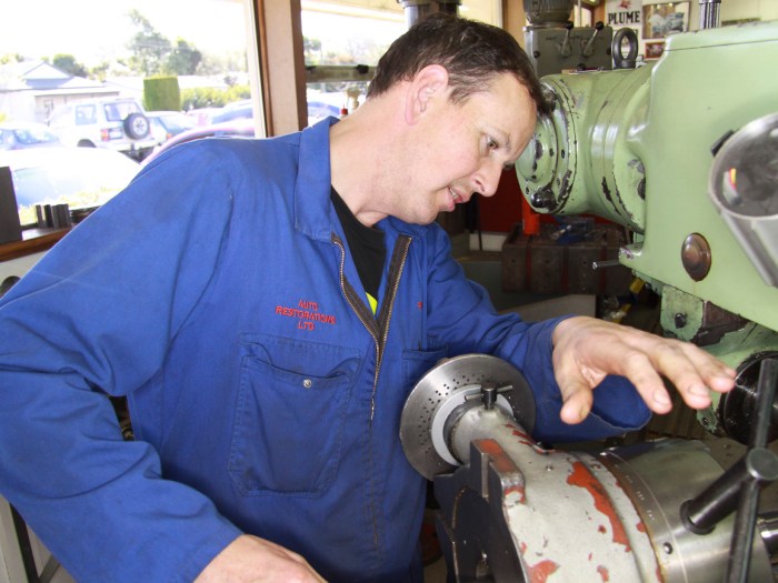 Simon Steffens machining a bespoke part in the Auto Engineering Shop at Auto Restorations.