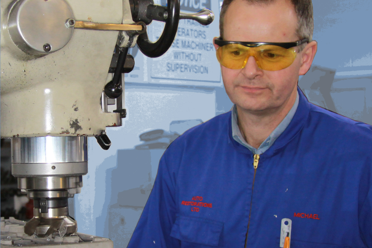 Michael Pidgeon tooling a classic engine rebuild in the Auto Engineering Shop at Auto Restorations.