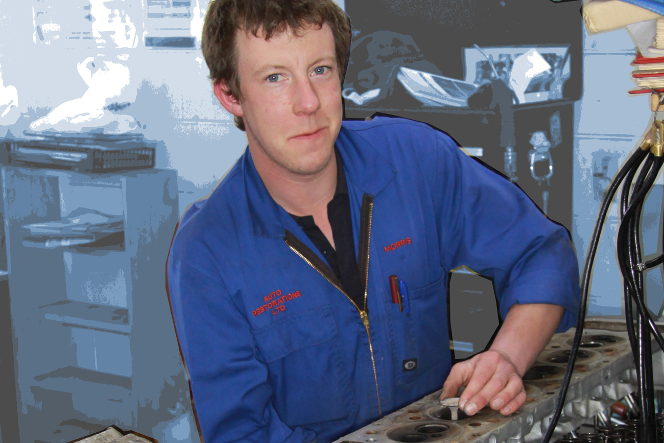 Morris Wright at work on a classic Bugatti head in the Mechanical Shop at Auto Restorations.